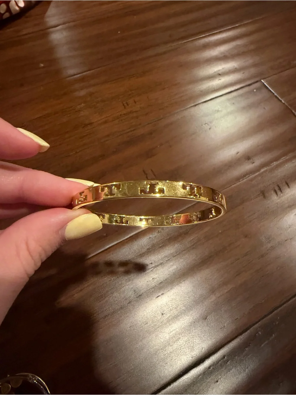 Tory Burch sleek gold
